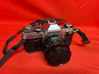 Canon AE-1 SLR Film 35mm Camera 50mm Canon 1 : 1.8 FD Lens